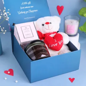 FlowerAura Hamper includes Scented Candle, Chocolate Jar Cake, Love Teddy for Birthday Gift, Anniversary Gift, Mother's Day Gift & Special Occasions Gift (Same Day Delivery)